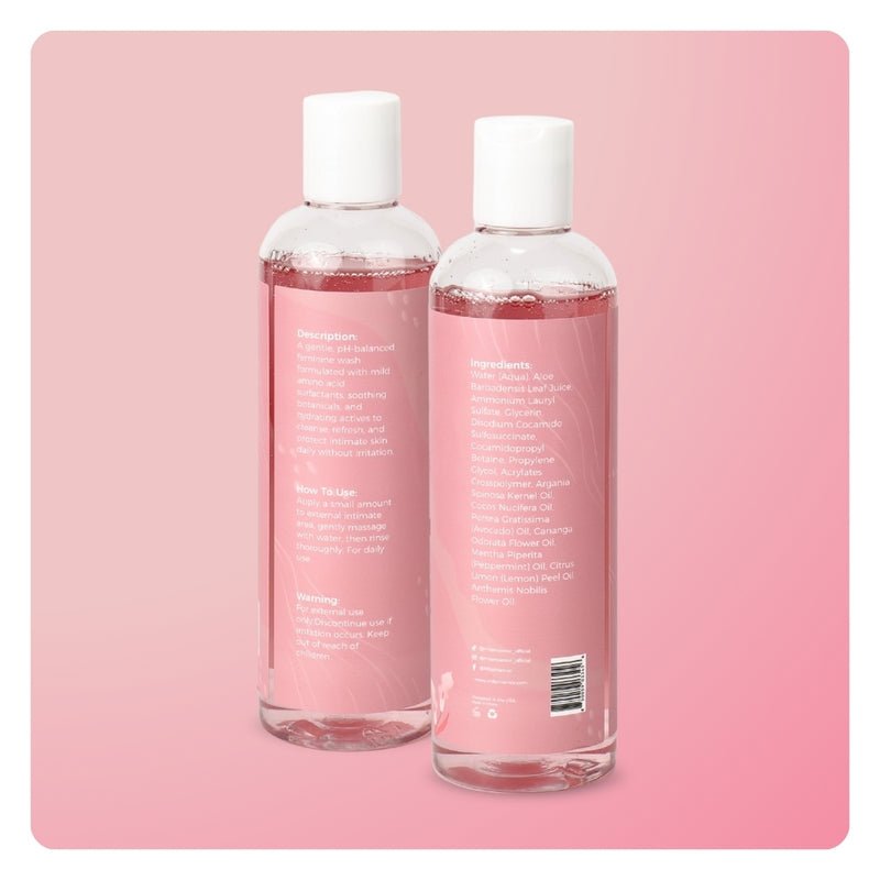 Back labels of two Mila MiAmor Feminine Wash bottles displaying the pH balanced description, full ingredients list, and daily use instructions.